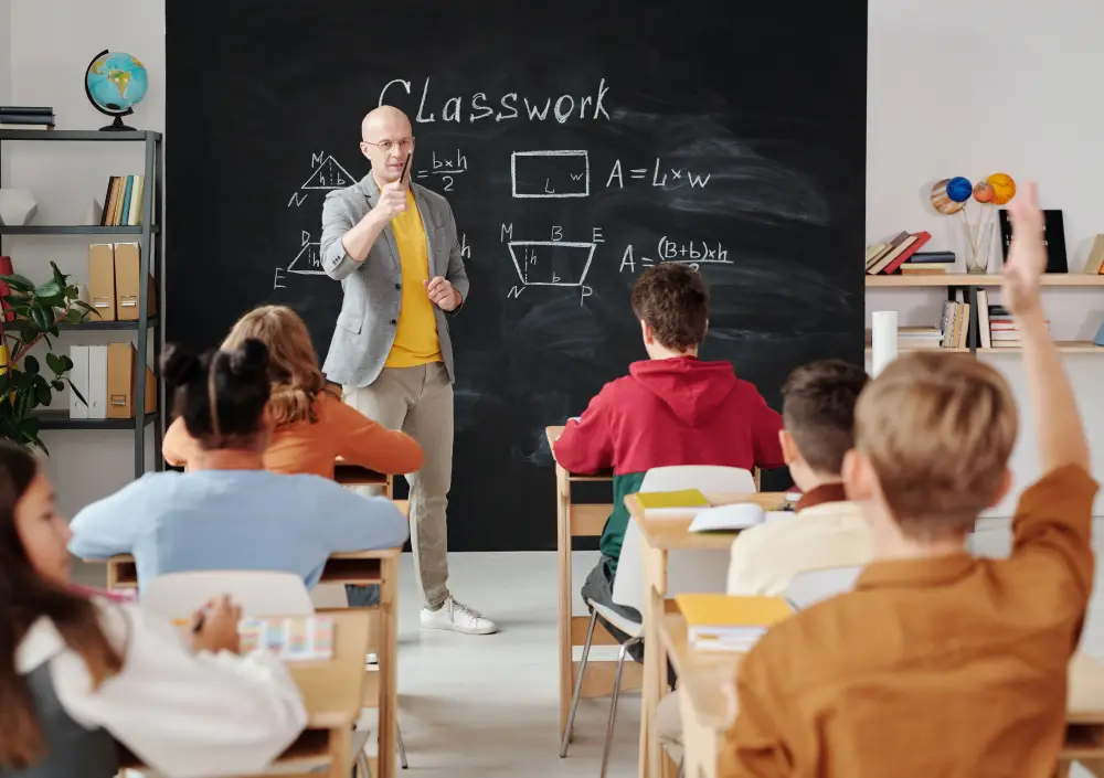 student raising hand